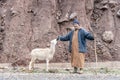 Berber shepherd with his sheep in remote High Atlas mountain Royalty Free Stock Photo