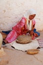 Berber Woman Grinding Corn, Matmata, Tunisia