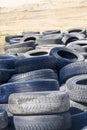 BERDSK, RUSSIA - APRIL 30, 2022: A bunch of old used worn out tires