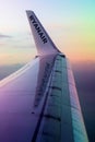 2019.10.28 Bergamo, Ryanair airport, Orio al Serio airport, detail of the wing in the flight phase Royalty Free Stock Photo