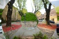 BERGAMO, ITALY - APRIL 2019: City of Bergamo reflected in a mirror surface of modern art object in Bergamo