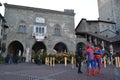 Street show of famous movie characters like spiderman, batman, superman, captain America.