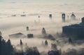 Bergamo, Italy. Drone aerial view of an amazing landscape of the fog rises from the plains and covers the old town Royalty Free Stock Photo