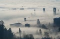 Bergamo, Italy. Drone aerial view of an amazing landscape of the fog rises from the plains and covers the old town Royalty Free Stock Photo