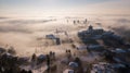 Bergamo, Italy. Drone aerial view of an amazing landscape of the fog rises from the plains and covers the old town Royalty Free Stock Photo