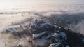 Bergamo, Italy. Drone aerial view of an amazing landscape of the fog rises from the plains and covers the old town Royalty Free Stock Photo