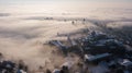 Bergamo, Italy. Drone aerial view of an amazing landscape of the fog rises from the plains and covers the old town Royalty Free Stock Photo