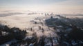 Bergamo, Italy. Drone aerial view of an amazing landscape of the fog rises from the plains and covers the old town Royalty Free Stock Photo