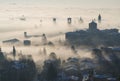 Bergamo, Italy. Drone aerial view of an amazing landscape of the fog rises from the plains and covers the old town Royalty Free Stock Photo