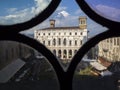 Bergamo. Italy. Landscape at the public library through the Venetian windows of the ancient administration building