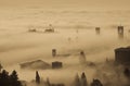 Bergamo, Italy. Lombardy. Amazing landscape of the fog rises from the plains and covers the old town Royalty Free Stock Photo