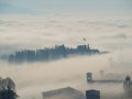 Bergamo, Italy. Lombardy. Amazing landscape of the fog rises from the plains and covers the old town Royalty Free Stock Photo