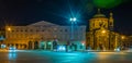 BERGAMO, ITALY, MARCH 19, 2016: Night view of the building of credito bergamasco and church of santa maria delle grazie Royalty Free Stock Photo