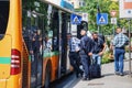 BERGAMO, ITALY - MAY 22, 2019: Officers of Security guard Guardia giurata check tickets at the stop when exiting the bus