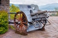 BERGAMO, ITALY - MAY 22, 2019: Old cannon weapon Obice da 100-17, M. 14, Skoda, 1914 in the park of the Fortress of Bergamo. The Royalty Free Stock Photo