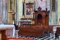 BERGAMO, ITALY - MAY 22, 2019: Old wooden confessional in the Catholic Church of Sant Agata nel Carmine in Bergamo Royalty Free Stock Photo