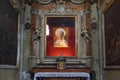 BERGAMO, ITALY - MAY 22, 2019: Side altar with Pope John Paul II portrait in the Catholic Church of Sant Agata nel Carmine in