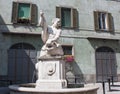 Bergamo, Italy, The Old city. The dolphin fountain in Pignolo street Royalty Free Stock Photo