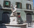 Bergamo, Italy, The Old city. The dolphin fountain in Pignolo street Royalty Free Stock Photo
