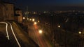 Bergamo, Italy. The old city. Landscape on the street along the ancient walls during the evening with trails of headlights Royalty Free Stock Photo