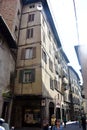 Bergamo / Italy / September 8 2018 : A narrow street in the old town of Bergamo. Tall medieval buildings.