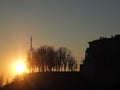 Bergamo, old city. Italy. Fiery sunset during fall season at Saint Giacomo ancient door Royalty Free Stock Photo