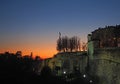 Bergamo, old city. Italy. Fiery sunset during fall season at Saint Giacomo ancient door Royalty Free Stock Photo