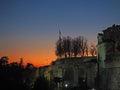 Bergamo, old city. Italy. Fiery sunset during fall season at Saint Giacomo ancient door Royalty Free Stock Photo