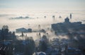 Bergamo, Italy. Lombardy. Amazing landscape of the fog rises from the plains and covers the old town Royalty Free Stock Photo