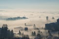 Bergamo, Italy. Lombardy. Amazing landscape of the fog rises from the plains and covers the old town Royalty Free Stock Photo