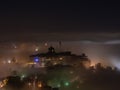 Bergamo, Italy. Lombardy. Amazing landscape of the fog rises from the plains and covers the old town Royalty Free Stock Photo