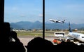 2019.09.30 Bergamo, Orio al Serio airport Ryanair plane in the foreground with passengers who board the plane in the back Royalty Free Stock Photo