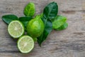 Bergamot with green leafs on wood table Royalty Free Stock Photo