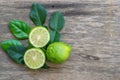 Bergamot with leafs on wood background Royalty Free Stock Photo