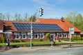 Bergen, Germany - April 30, 2017: Solar energy panel on a house roof on the blue sky background. Royalty Free Stock Photo