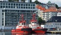 Tug boats BB Coaster and Boxer in Bergen harbour, Norway. Royalty Free Stock Photo