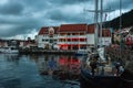 Bergen, Norway - July 30, 2013: Photo of Bergen Waterfront on a rainy evening. The coastline of the port of Bergen