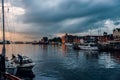 Bergen, Norway - July 30, 2013: Photo of Bergen Waterfront on a rainy evening. The coastline of the port of Bergen