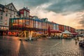 Bergen, Norway - July 30, 2013: Photo of Bergen Waterfront on a rainy evening. The coastline of the port of Bergen