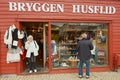 Tourists do shopping at a souvenir shop in Bergen, Norway. Royalty Free Stock Photo