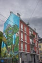 Wall murals add bright color to the city streest of Bergen, Norway especially on grey, cloudy, overcast days