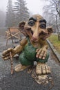 Bergen, Norway - March 8, 2012: huge giant troll wooden sculpture mythical creature guard of forest of viking