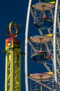 Close-up and detail of colorful ferris wheel on blue sky