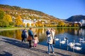 Family resting at the Store LungegÃÂ¥rdsvannet In the afternoon and clear sky, the mountains