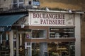 Front store of a Boulangerie Patisserie, a typical french bakery pastry shop selling bread, pastries, symbol of french gastronomy