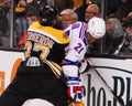 Bergeron pins Stepan against the boards. Royalty Free Stock Photo