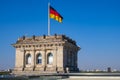 Berlin, Germany - Rooftop of the Reichstag building with the historic corner tower and Germany flag with Berlin skyline in Royalty Free Stock Photo