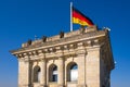 Berlin, Germany - Rooftop of the Reichstag building with the historic corner tower and Germany flag with Berlin skyline in Royalty Free Stock Photo