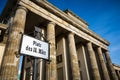 Berlin Brandenburg Gate with street sign