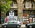 Berlin, cars parked in front of dilapidated Kunsthaus Tacheles